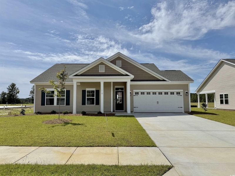 Front exterior of a new home in Oak Grove, Conway, SC, highlighting curb appeal (Image 1).