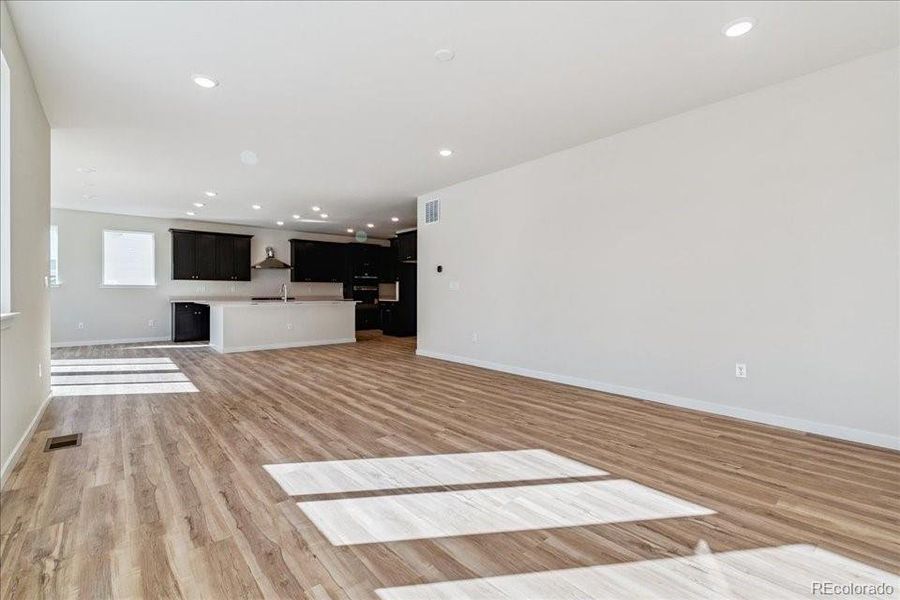 Spacious, unfurnished interior of a new home in Floret Collection at Alder Creek, Parker (Image 17).