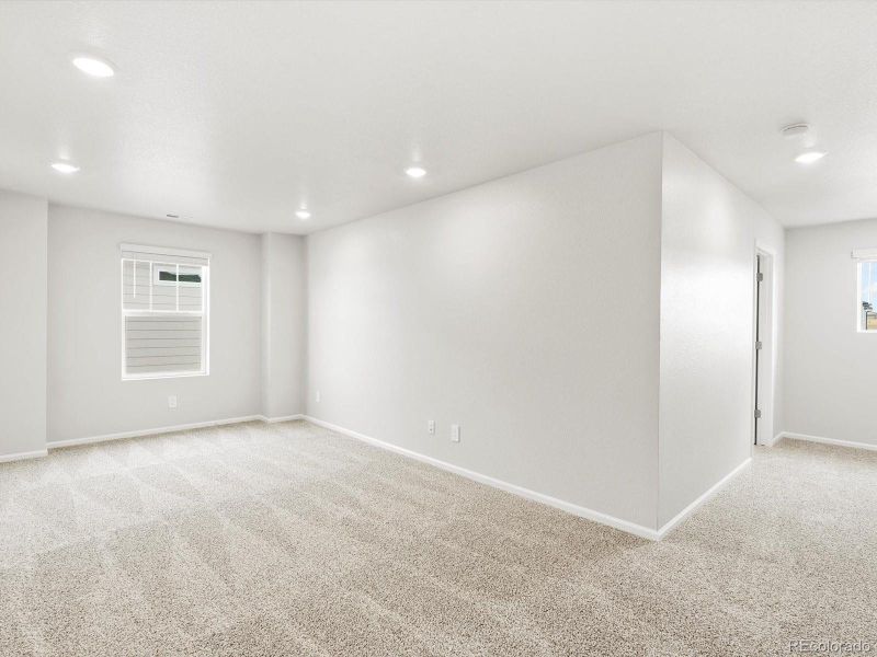 Spacious, unfurnished interior of a new home in Buffalo Highlands: The Flora Collection, Commerce City (Image 13).