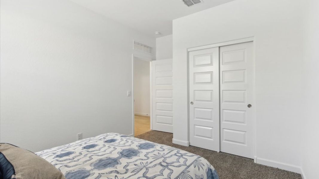 Representative furnished interior of a home built from the Justin by D.R. Horton in Sorrento, Maricopa (Image 29).