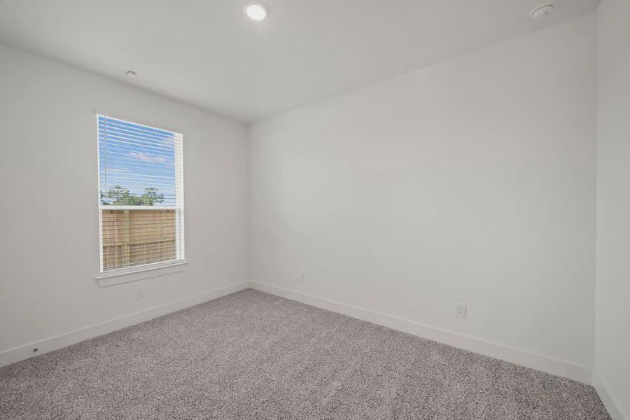 Representative unfurnished interior of a home built from the Mariah by Chesmar Homes in Lakes of Cane Island, Katy (Image 19).