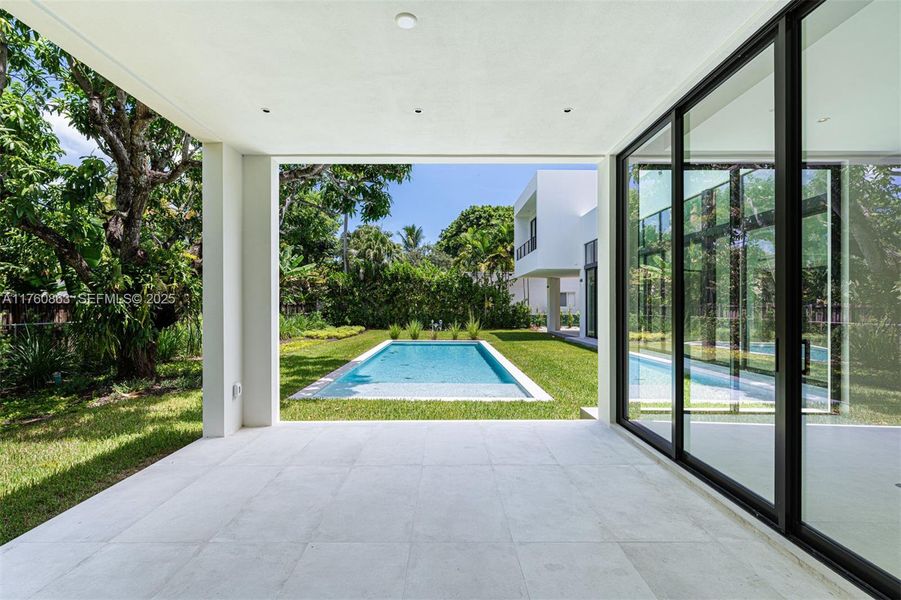 Exterior details and patio area of a home in , South Miami (Image 3).
