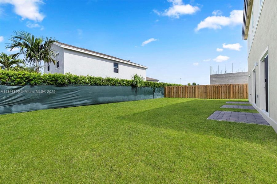 Front exterior of a new home in , Homestead, FL, highlighting curb appeal (Image 17).