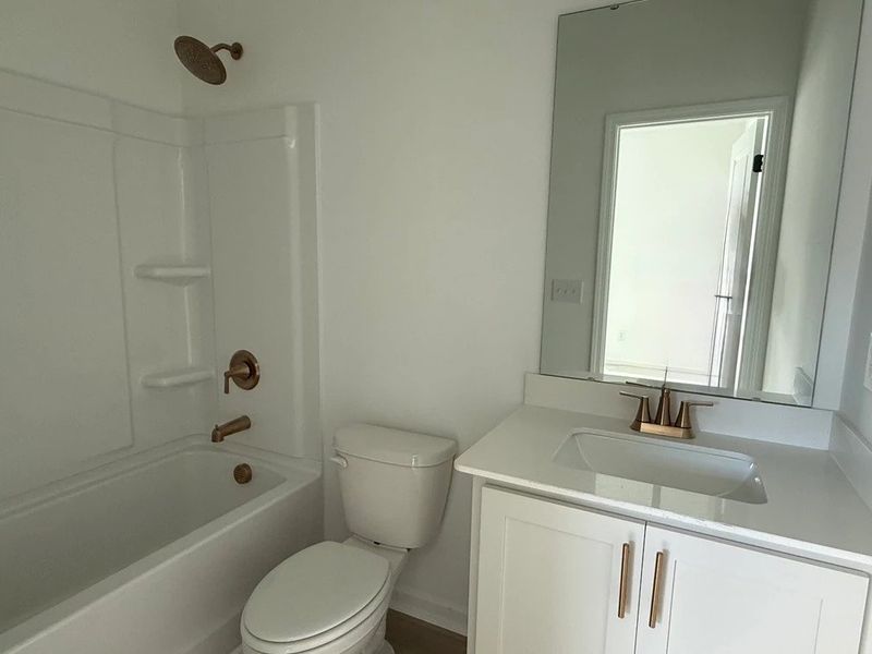 Bath 3 featuring the AW Collection® Serene - Earth-toned surfaces bring warmth and calm. Bath 3 featuring the AW Collection® Serene - Earth-toned surfaces bring warmth and calm.