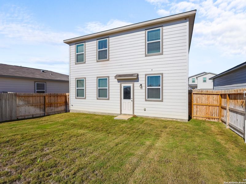 Exterior details and patio area of a home in Applewhite Meadows, San Antonio (Image 4).