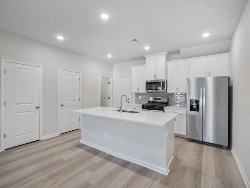 Furnished interior view inside a new home in The Rows at Buffaloe Reserve, Raleigh (Image 3).