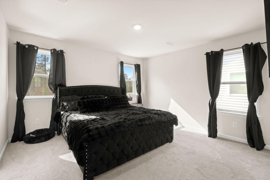 Furnished interior view inside a new home in Jasmine Point at Lakes of Cane Bay, Summerville (Image 19).