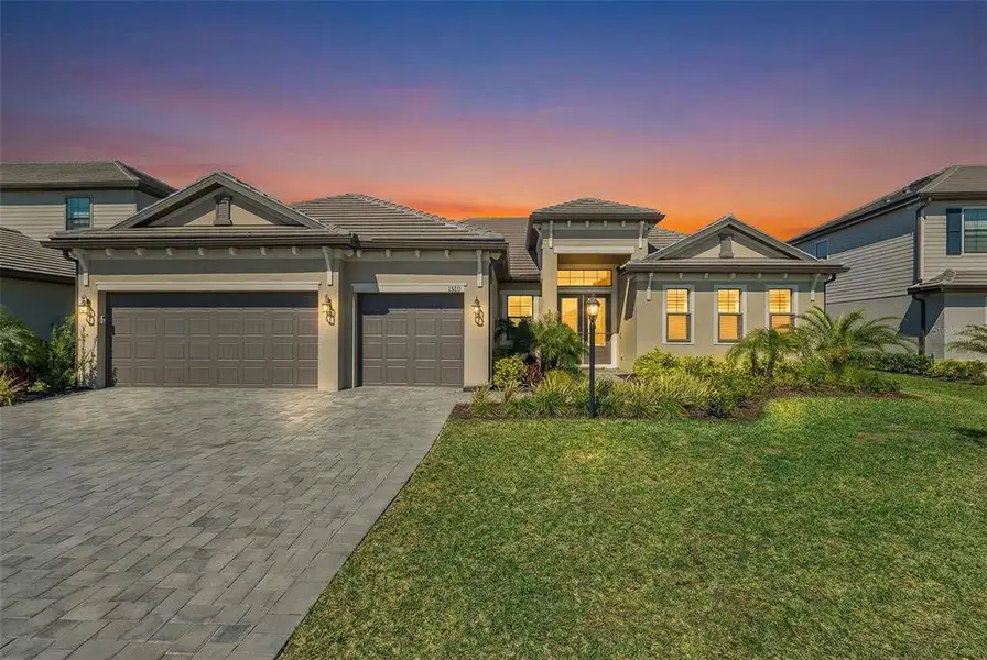 Front exterior of a new home in , Lakewood Ranch, FL, highlighting curb appeal (Image 23).