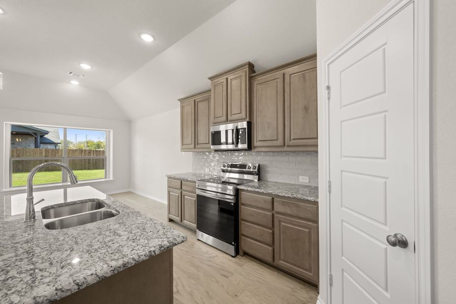 Furnished interior view inside a new home in Summer Crest, Fort Worth (Image 8). Furnished interior view inside a new home in Summer Crest, Fort Worth (Image 8).