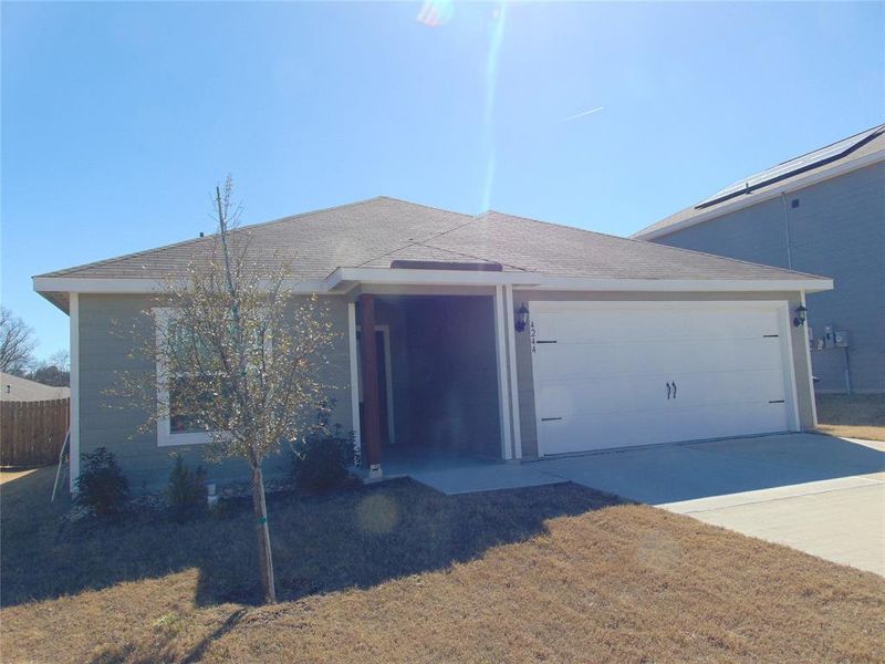 Front exterior of a new home in College Park, Dallas, TX, highlighting curb appeal (Image 15).