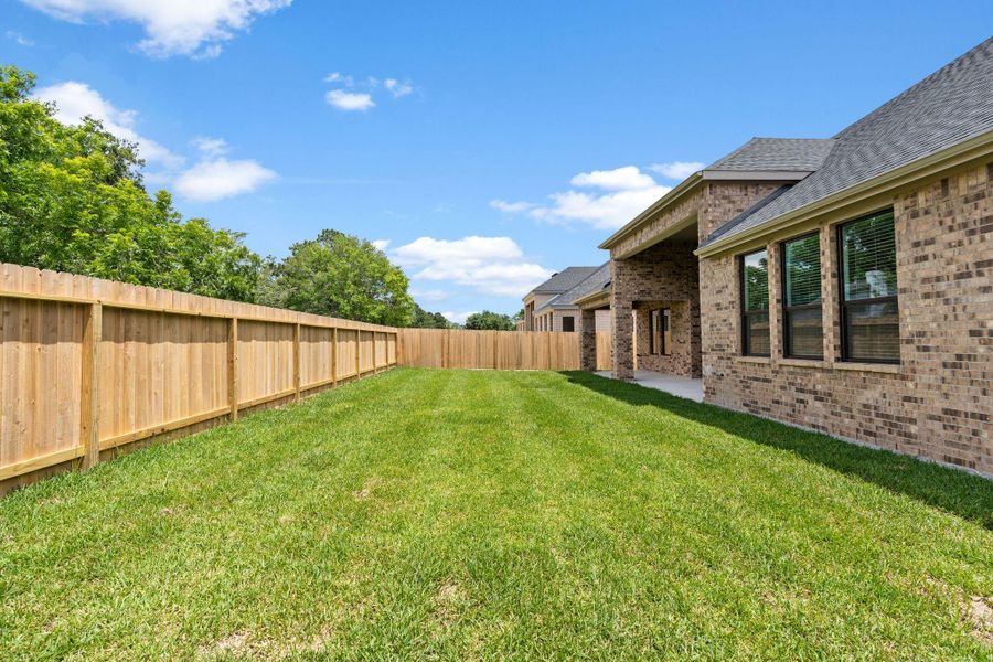 Exterior details and patio area of a home in Friendswood Trails, Friendswood (Image 34). Exterior details and patio area of a home in Friendswood Trails, Friendswood (Image 34).