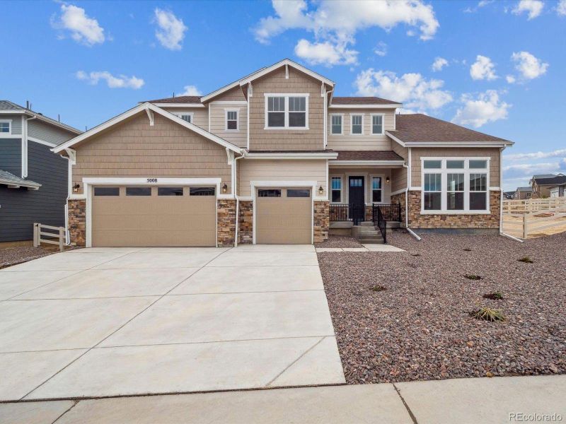 Exterior details and patio area of a home in Vista Pines at Crystal Valley, Castle Rock (Image 2).