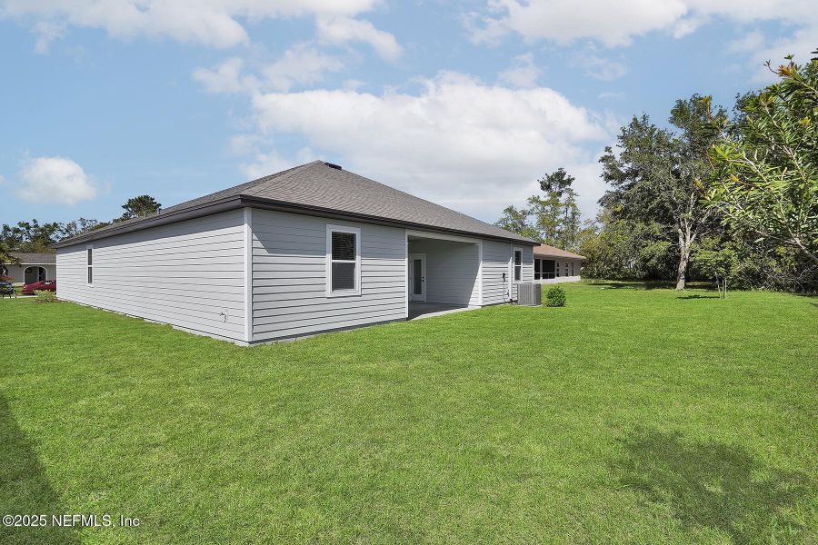 Front exterior of a new home in , Jacksonville, FL, highlighting curb appeal (Image 1). Front exterior of a new home in , Jacksonville, FL, highlighting curb appeal (Image 1).