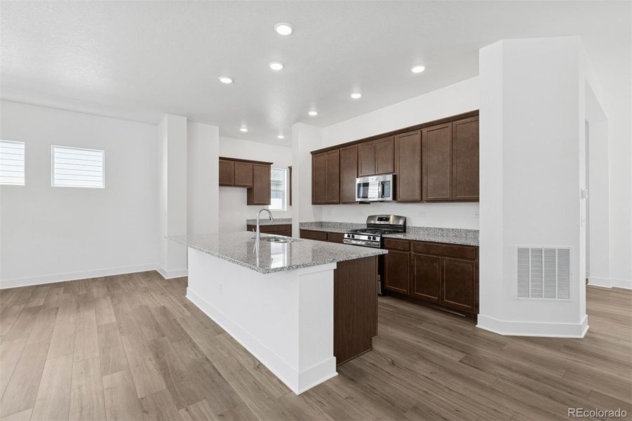 Furnished interior view inside a new home in Painted Prairie Cottage, Aurora (Image 8).