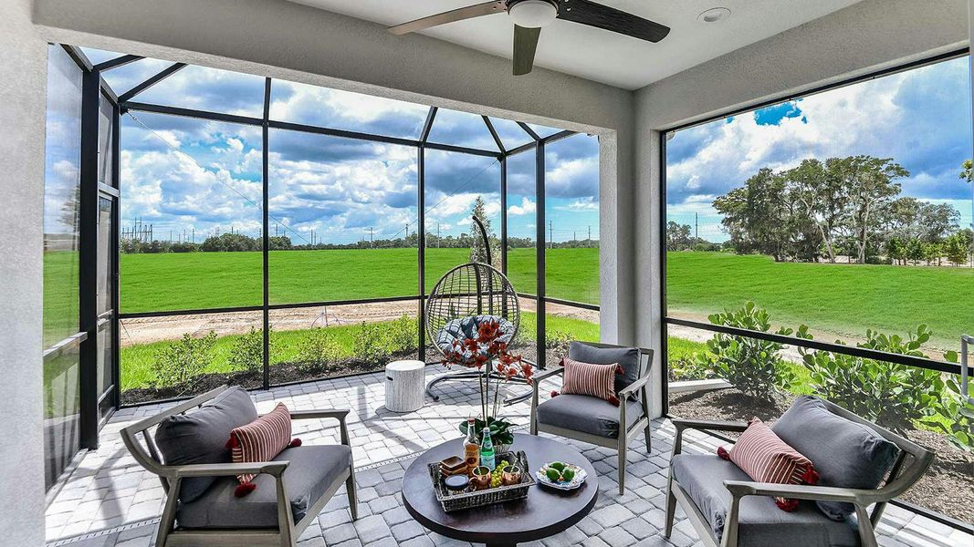 Exterior details and patio area of a home in Windward Real Estate and Homes for Sale in Sarasota, FL - Neal Communities, Sarasota (Image 3).