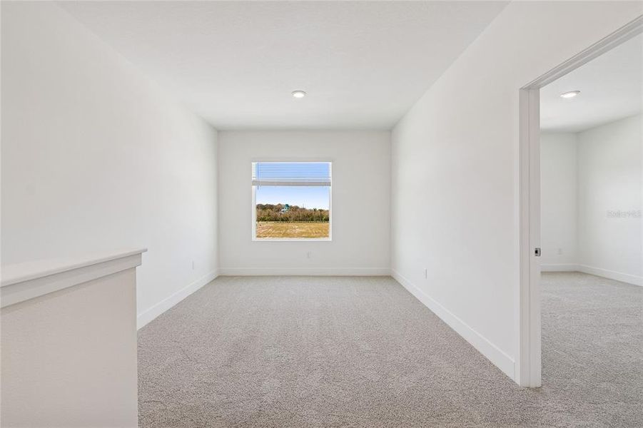 Spacious, unfurnished interior of a new home in North River Ranch – Townhomes, Parrish (Image 28).