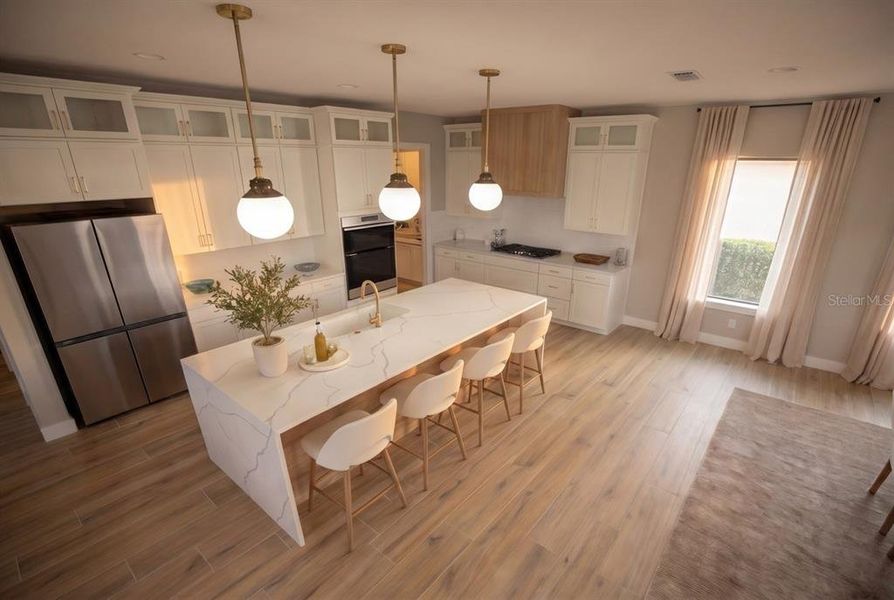 Furnished interior view inside a new home in Bella Collina, Montverde (Image 5).