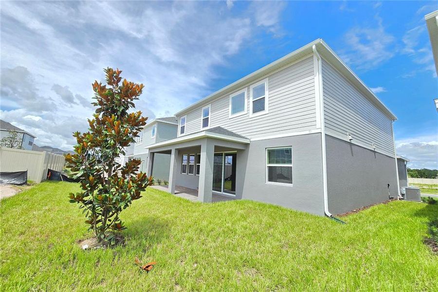 Exterior details and patio area of a home in Bay Lake Farms, St. Cloud (Image 29).