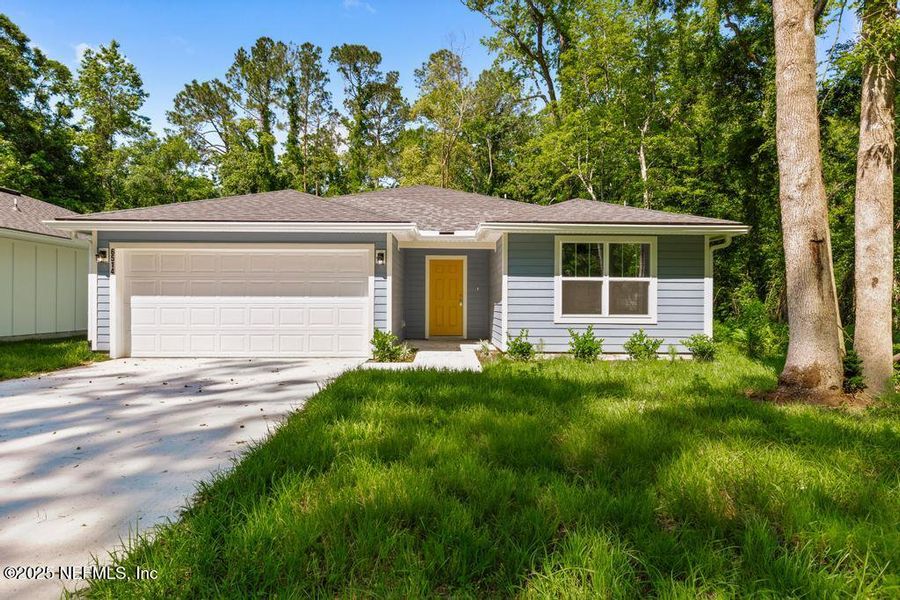 Front exterior of a new home in , Jacksonville, FL, highlighting curb appeal (Image 21).