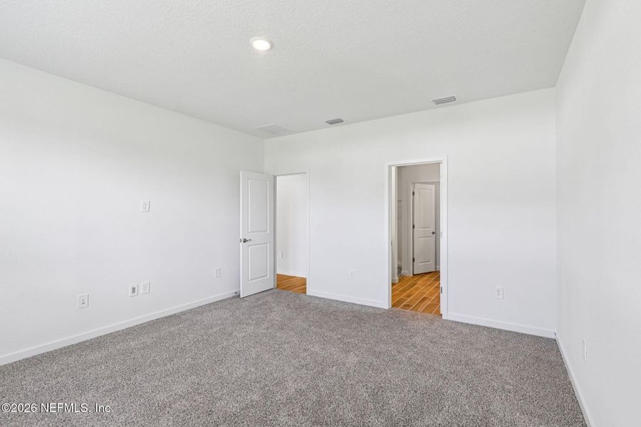 Spacious, unfurnished interior of a new home in Flagler Village - Signature Series, Palm Coast (Image 24). Spacious, unfurnished interior of a new home in Flagler Village - Signature Series, Palm Coast (Image 24).