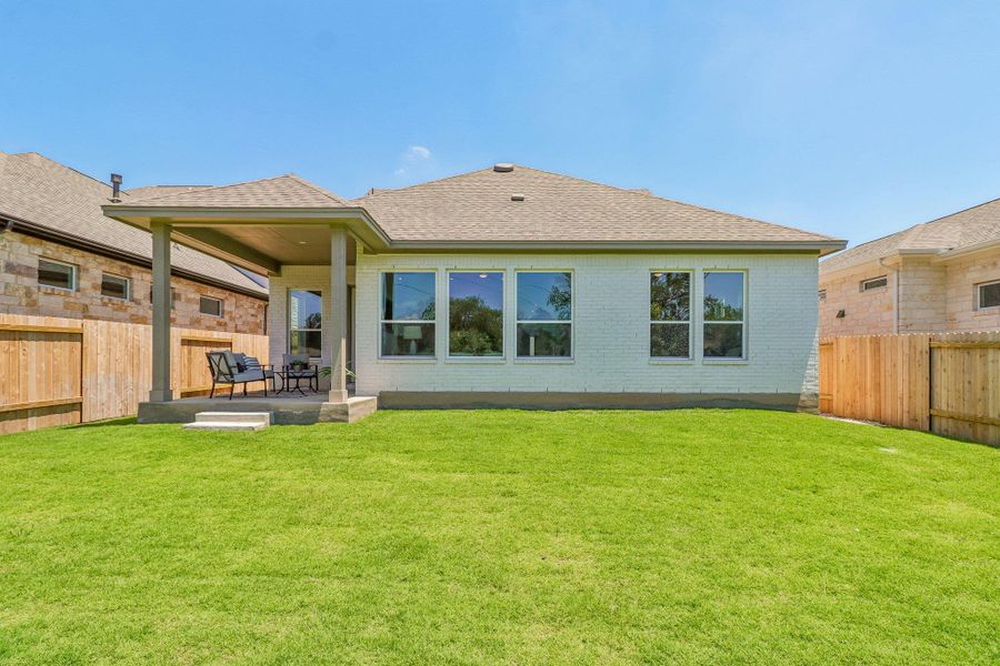 Exterior details and patio area of a home in Persimmon, Buda (Image 4).