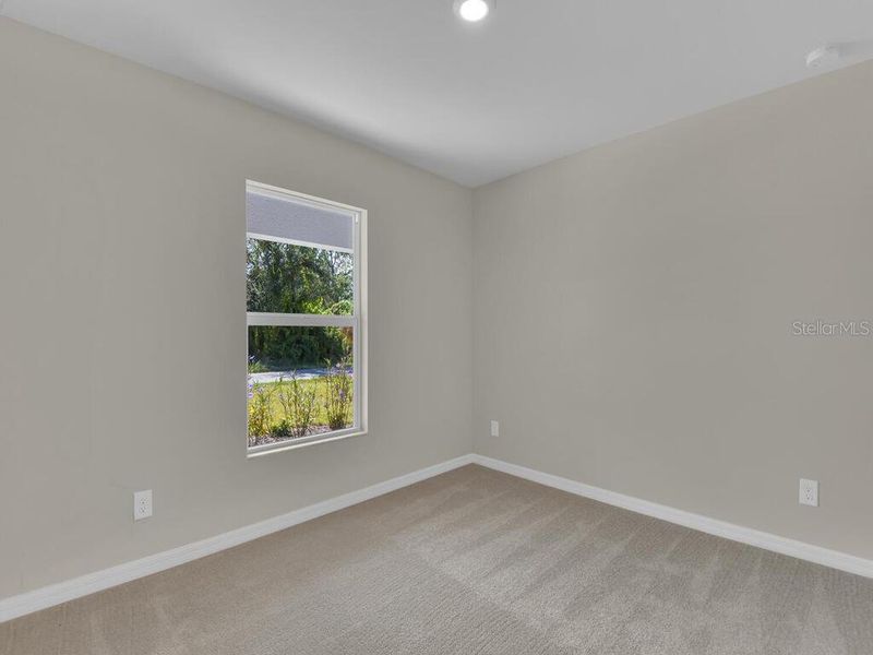 Spacious, unfurnished interior of a new home in , Port Charlotte (Image 9).
