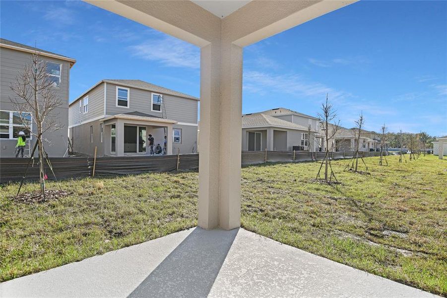 Exterior details and patio area of a home in Seasons at Magnolia Pointe, Umatilla (Image 4).