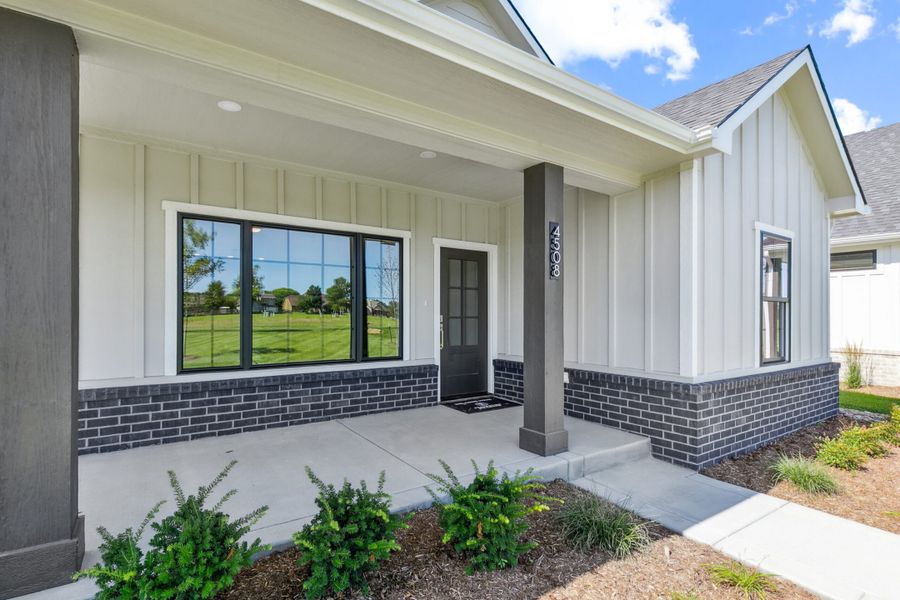 Exterior details and patio area of a home in The Courtyards at The Moorings, Wichita (Image 3). Exterior details and patio area of a home in The Courtyards at The Moorings, Wichita (Image 3).