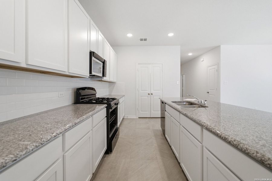 Furnished interior view inside a new home in Red Hawk Landing, San Antonio (Image 9).
