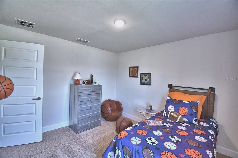 Furnished interior view inside a new home in Magnolia Park, Haines City (Image 22).