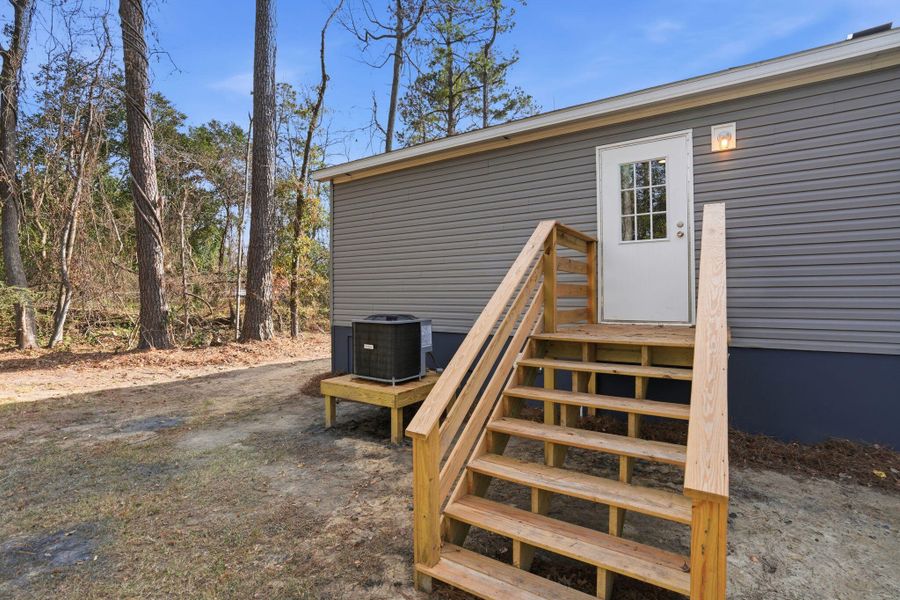 Exterior details and patio area of a home in , St. Stephen (Image 21).