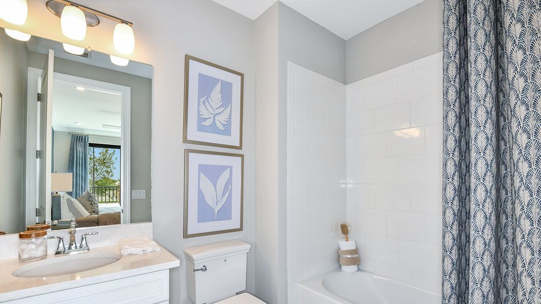 Furnished interior view inside a new home in Esplanade by the Islands Coach Homes, Naples (Image 13).