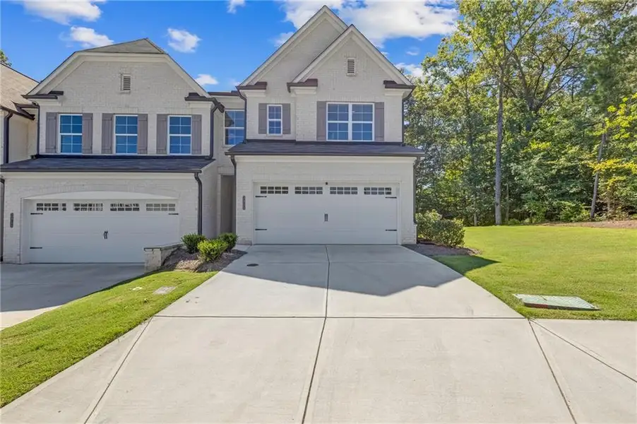 Front exterior of a new home in , Duluth, GA, highlighting curb appeal (Image 2). Front exterior of a new home in , Duluth, GA, highlighting curb appeal (Image 2).