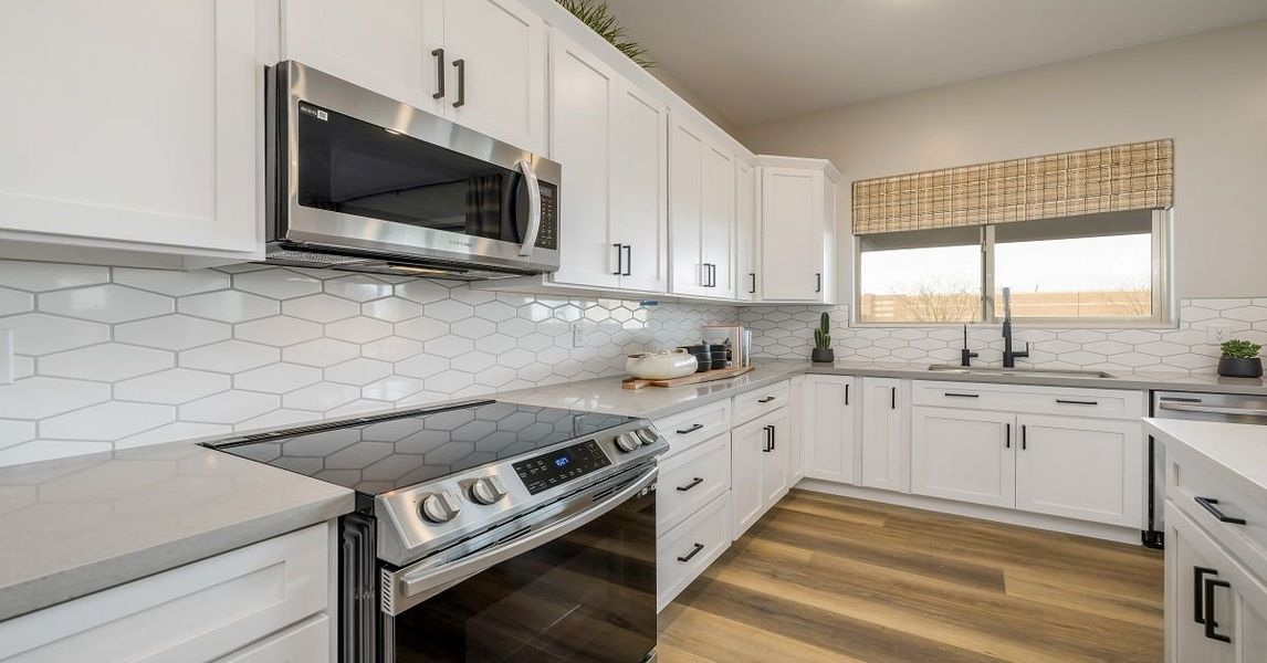 Representative furnished interior of a home built from the Camelback by William Ryan Homes in Alta Vida at Westpark, Buckeye (Image 14).