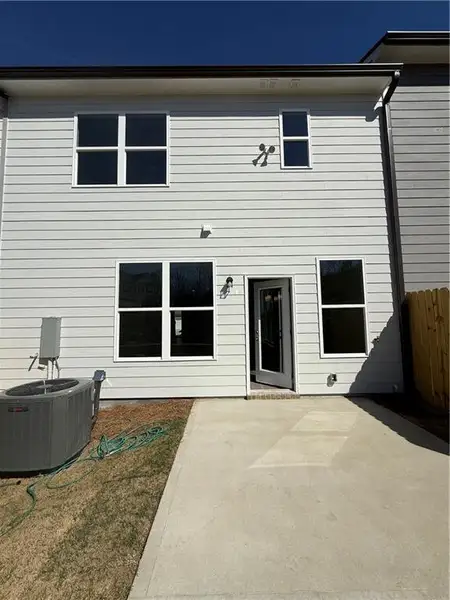 Exterior details and patio area of a home in Somerset at Riverbrook, Gainesville (Image 3).