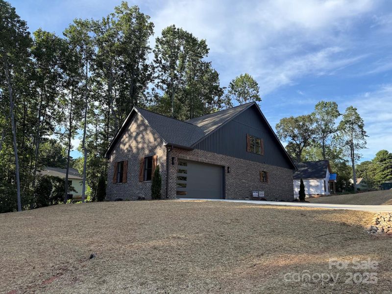 Front exterior of a new home in , Hildebran, NC, highlighting curb appeal (Image 15).
