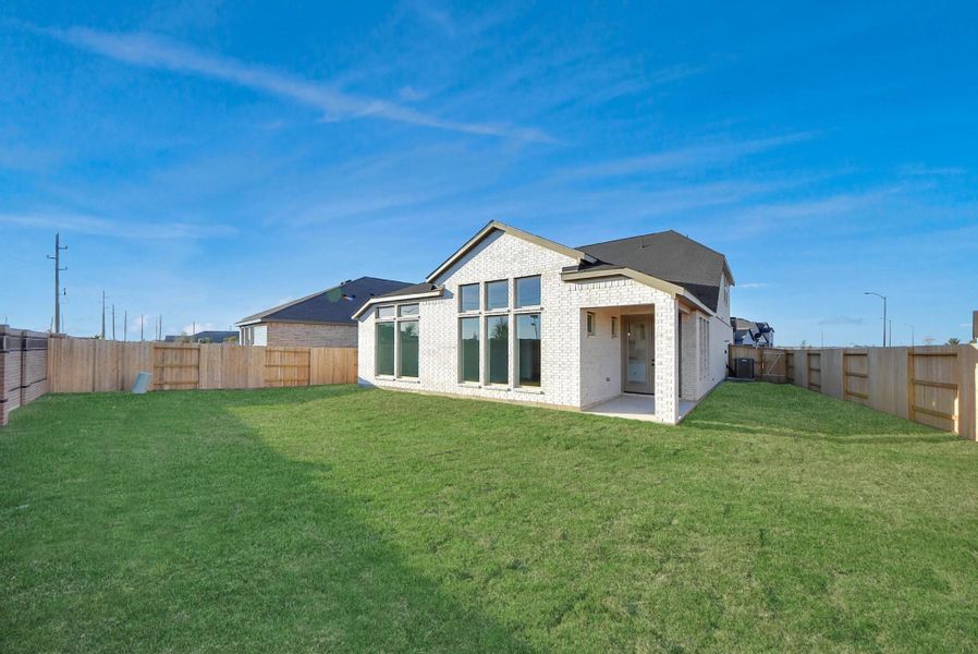Exterior details and patio area of a home in Elyson, Katy (Image 14).