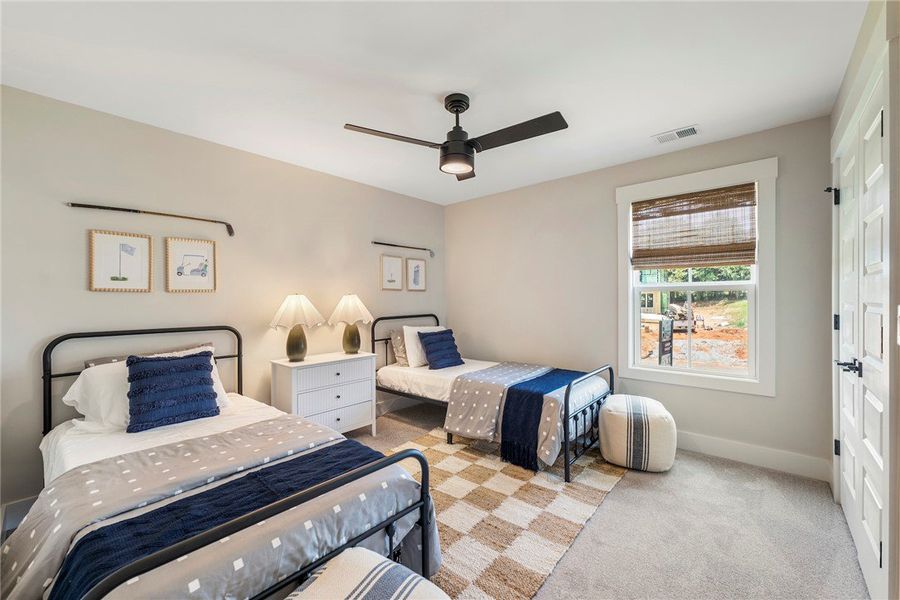 This inviting bedroom features ample natural light