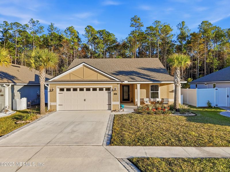 Front exterior of a new home in Parkland Preserve, St. Augustine, FL, highlighting curb appeal (Image 2).