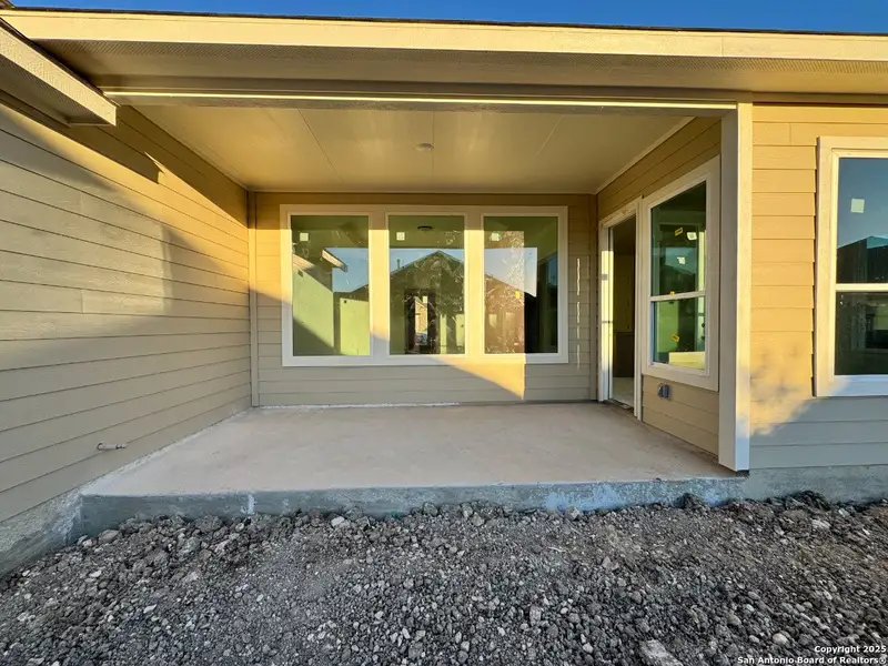 Exterior details and patio area of a home in , Castroville (Image 2).