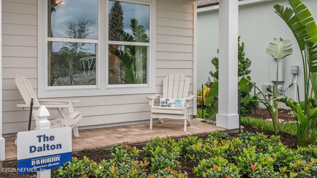Exterior details and patio area of a home in Sawmill Branch, Palm Coast (Image 4).
