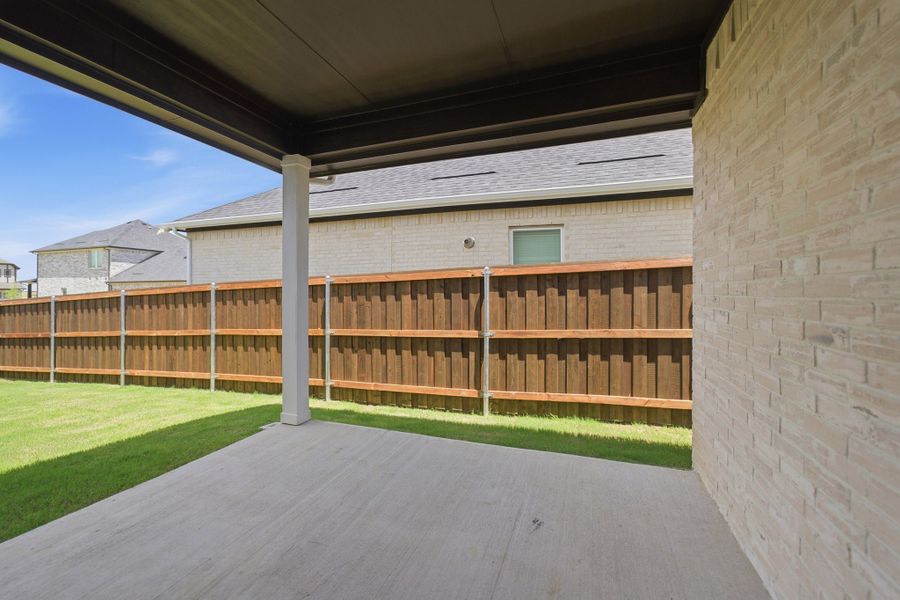 Exterior details and patio area of a home in La Terra, Celina (Image 22). Exterior details and patio area of a home in La Terra, Celina (Image 22).