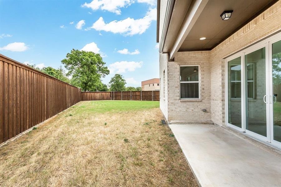 View of yard with a patio area