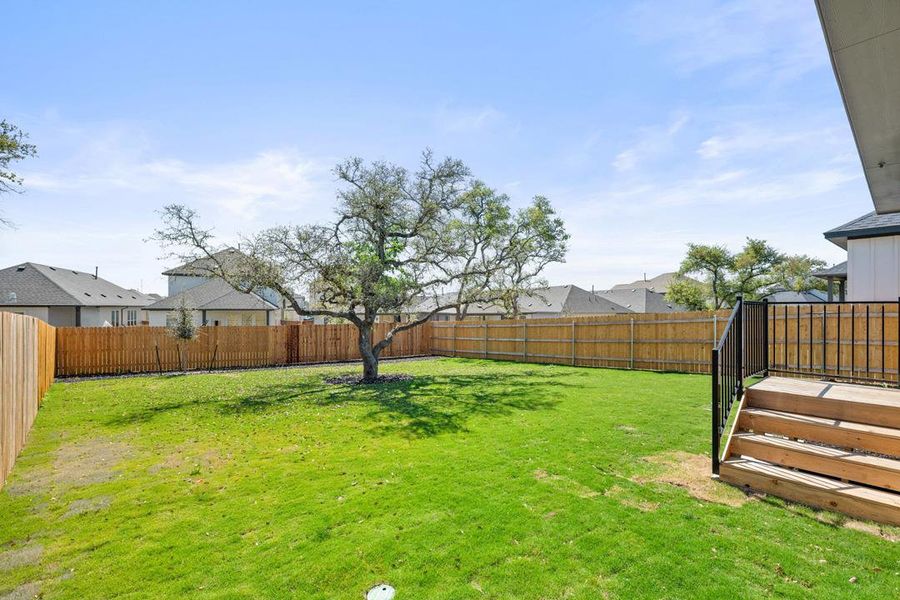 Exterior details and patio area of a home in Heritage, Dripping Springs (Image 23).