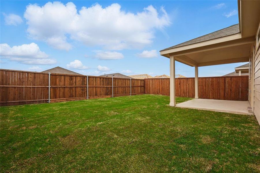 View of yard with a patio and a fenced backyard View of yard with a patio and a fenced backyard