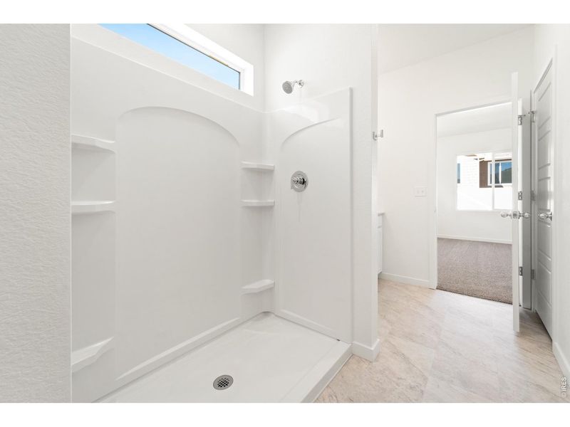 Spacious, unfurnished interior of a new home in Union Colony West, Greeley (Image 13).