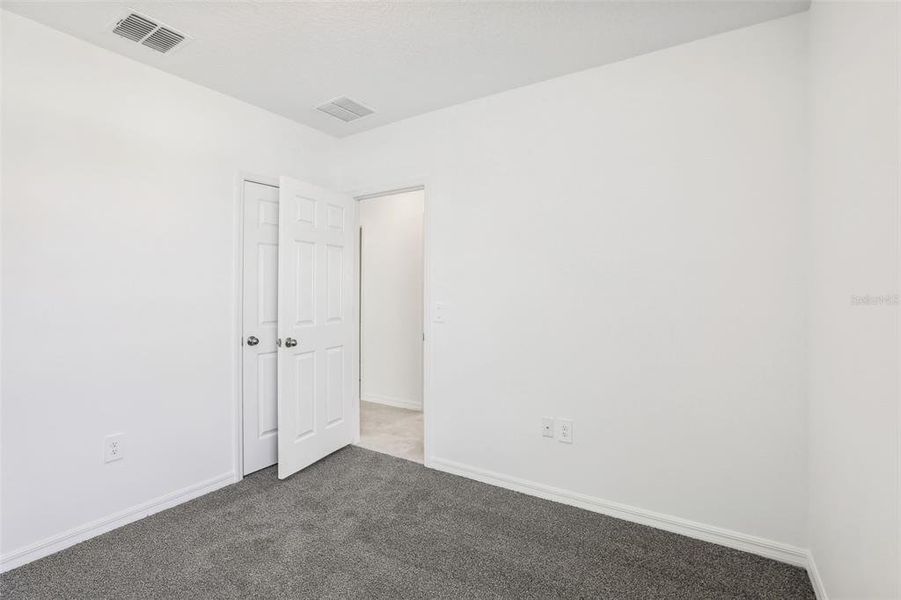 Spacious, unfurnished interior of a new home in Lake Deer Estates - Classic Series, Poinciana (Image 23).