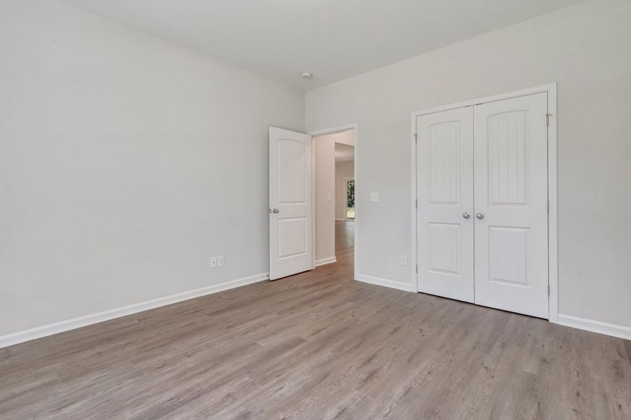 Representative unfurnished interior of a home built from the The Stonecrest by Smith Family Homes in Ramsey Landing, Rincon (Image 30).