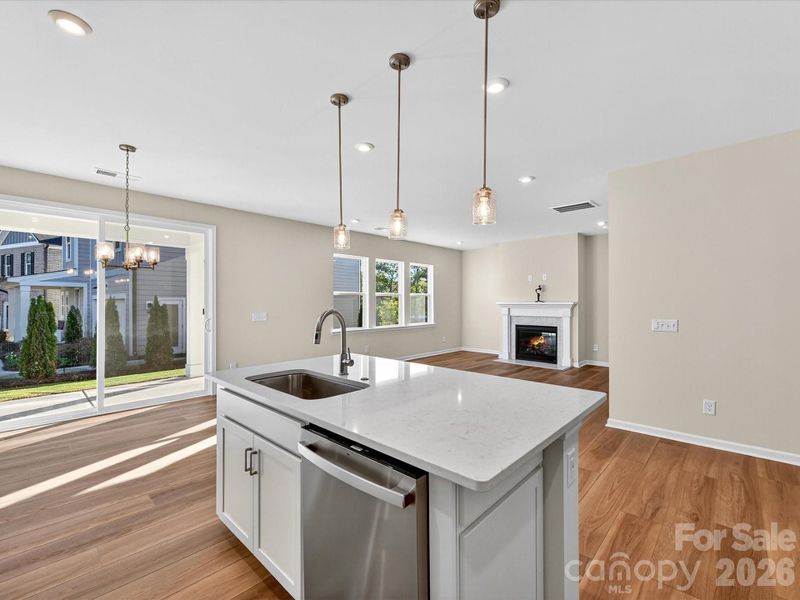 Large Central Island with Quartz Countertop. Large Central Island with Quartz Countertop.