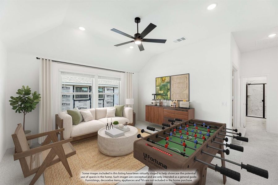 Bonus room with vaulted ceiling, ceiling fan, sofa seating, and foosball table